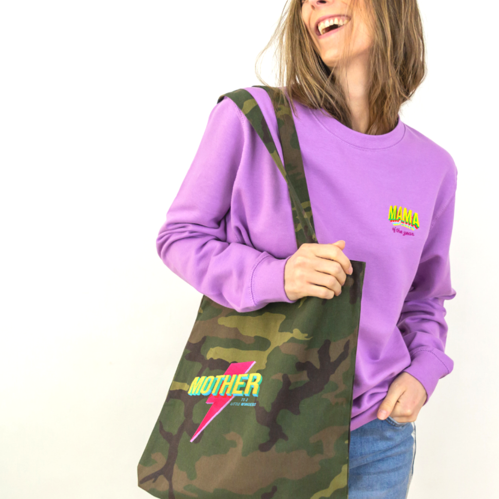 http://www.percyandnell.com/cdn/shop/collections/camo_bag_with_lady_1.png?v=1662366971